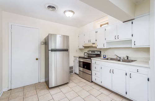 Flat Rock Condo | Dog-friendly gem on the lake with pool, beach, lush acreage, fast WiFi & kitchen