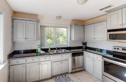 Eastpoint House | Dog-friendly home with lovely water view, roomy deck, fast WiFi, central AC, W/D