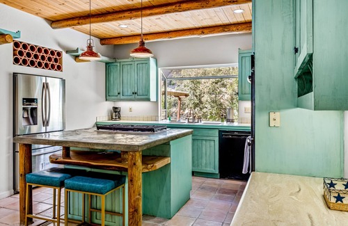 Forest Meadows House | Dog-friendly home and studio with private hot tub, central AC, and pool table