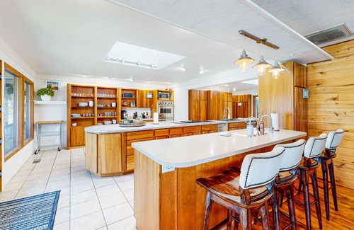 Garfield House | Dog-friendly home with lake views, washer/dryer, pool, basketball & fireplace