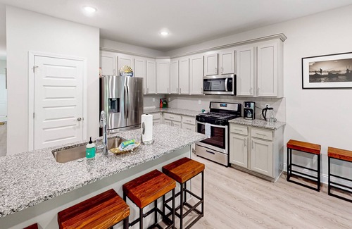 Port St. Joe House | Dog-friendly house with a pool, central AC, washer/dryer, patio, & WiFi