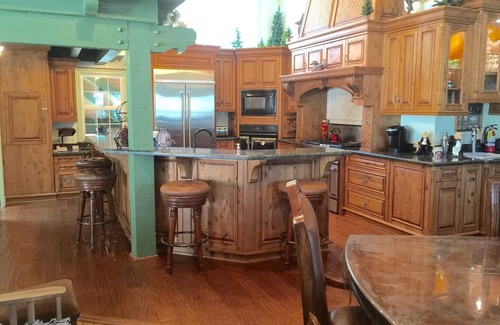 Bass Lake House | Dog-friendly, lake view home with a boat slip, three decks, & WiFi