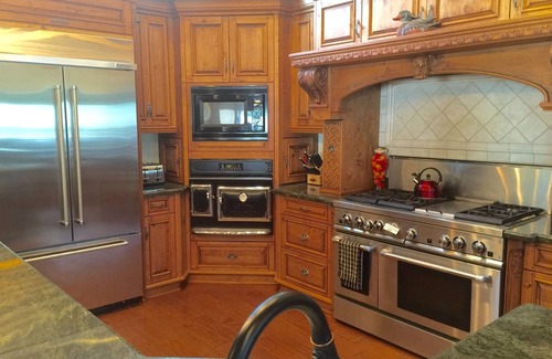 Bass Lake House | Dog-friendly, lake view home with a boat slip, three decks, & WiFi