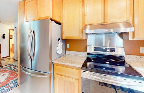 Port Orford House | Dog-friendly lakefront home with lake views, deck, partial AC, & W/D