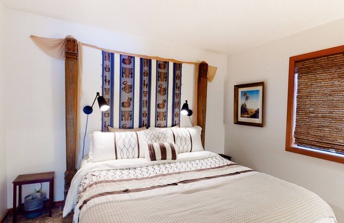 Port Orford House | Dog-friendly lakefront home with lake views, deck, partial AC, & W/D
