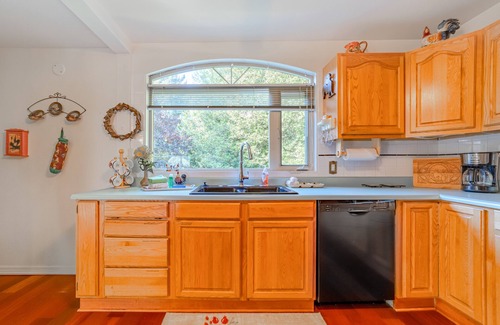 Crescent City House | Dog-friendly, riverfront home with deck, fireplace, kayaks & water access