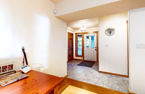 West Hills House | Dog-friendly, riverfront getaway with a wood stove & full kitchen!