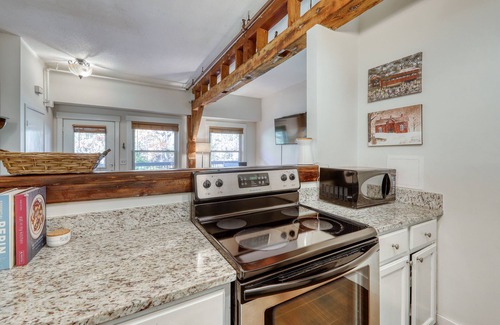Ludlow Condo | Dog-friendly & riverfront condo one mile from Okemo with wood fireplace