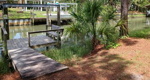 Alligator Point House | Dog Friendly-Short Walk to Beach-Canal Front-Screened Porch-Peaceful