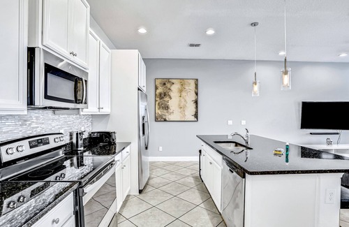 Davenport House | Dog-friendly townhome with private pool, screened lanai, fast WiFi, W/D, AC