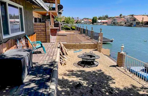 Victorville House | Dog-friendly waterfront home with private beach, firepit, dock, fireplace, grill