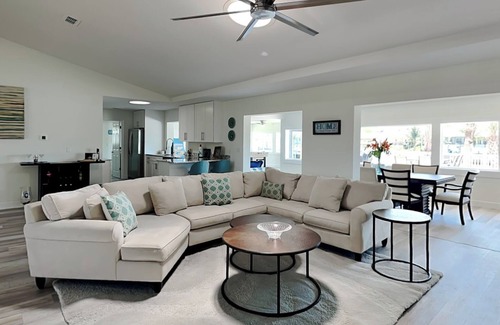 Palm Harbor House | Dolphin View Oasis | Spacious Pet-Friendly Canal-front Home with Game Room+ Dock