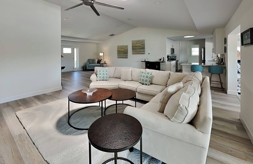 Palm Harbor House | Dolphin View Oasis | Spacious Pet-Friendly Canal-front Home with Game Room+ Dock