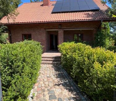 Szczytno House | Dom pod głogami