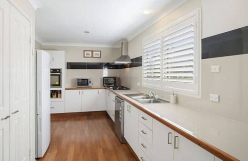 Dora Creek House | Dora Lodge - fishing, bikes and river frontage
