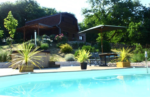 Betaille House | Dordogne Valley Lot timber-frame house set in greenery.