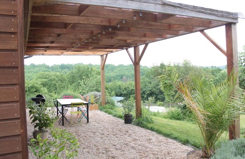 Betaille House | Dordogne Valley Lot timber-frame house set in greenery.