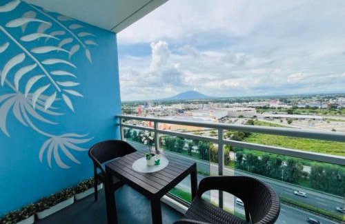 San Fernando Apartment | Double Deluxe Room with Mount Arayat View at Azure North San Fernando Pampanga