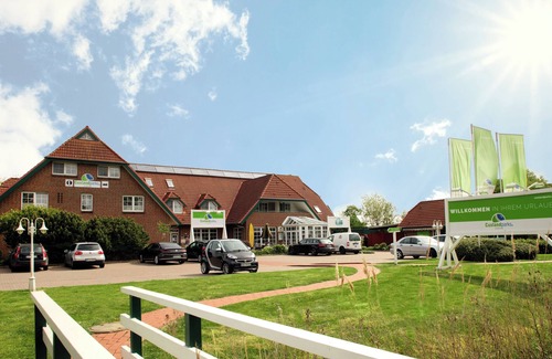 Dorumer Neufeld Apartment | Double room 116. With garden view and dog-friendly.