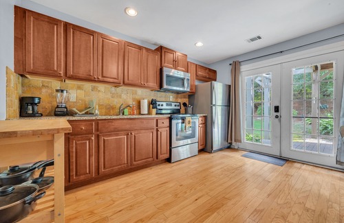Buford House | Downstairs Unit - Pool + Tennis Access + Patio