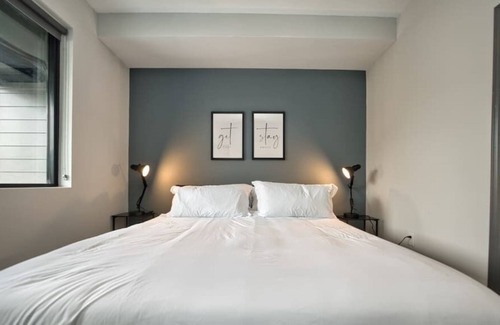 Lockerbie Square Apartment | Downtown 1BR: Gym Access, King Bed, Free Parking, Modern 1-BR: King Bed, Gym Access, Free Parking