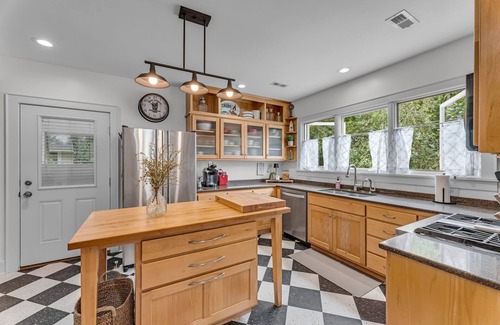 East Lawrence House | Downtown Red Brick Retreat