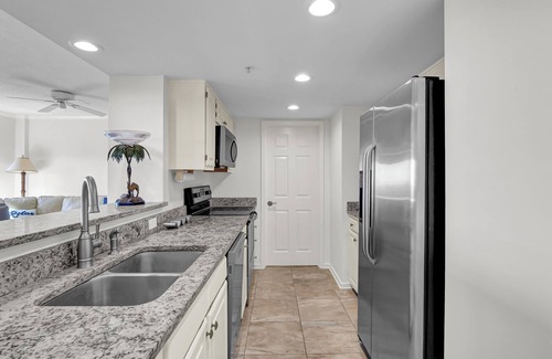 Shell Island Condo | DR 2103 - Beautifully updated condo with pool, tennis, and elevator