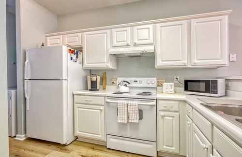 Sunset Beach Condo | Dreamy lakefront condo near the beach with WiFi, private patio & shared pool