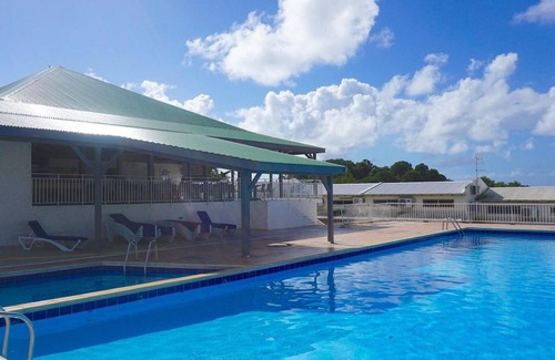 Bas du Fort Apartment | Duplex with breathtaking view of the marina du gosier with swimming pool and cistern