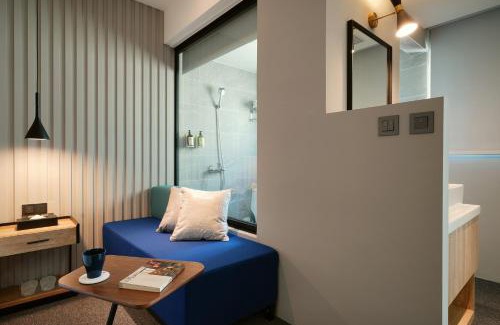 Xinshi Hotel | E Hotel