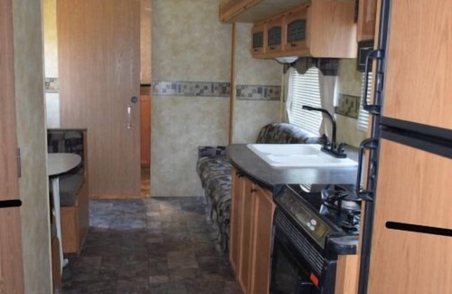 Onanole House | Eagle- Camper at Sunset Bay