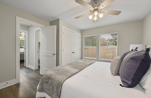 Bryan House | East 27th Bungalow 2 BR, 1 BA, Fully Remodeled, Large Yard and Covered Patio