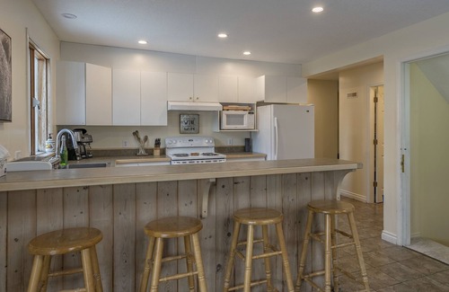 Silver Star Mountain House | Easy ski-in and ski out from this home with private hot tub, laundry & fireplace