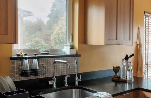 Rainier Valley House | Eclectic Redbrick Rambler near Japanese Gardens