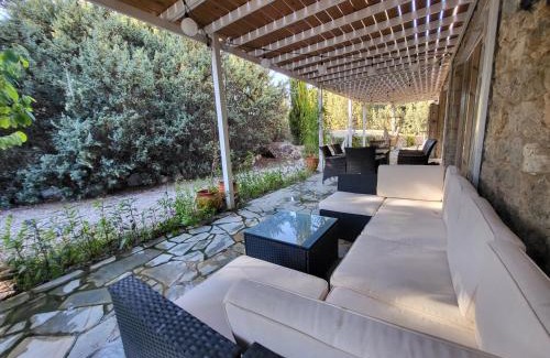 Mastichari House | Eco Secluded hand built stone house in an oasis