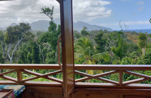 Calibishie Cottage | Ecolodge on 25 acre estate, 2 beaches, wide variety of fruit and flowers.