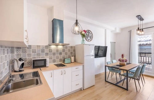 Pradollano Apartment | Edificio Los Alpes Apartment 'Frio Y Sol' with mountain views, private terrace, parking space, private parking space