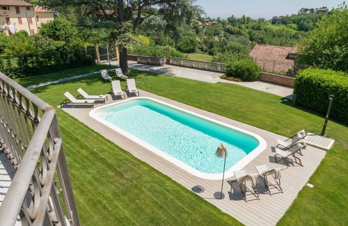 Vignale Monferrato Apartment | Elegant and spacious villa perfect for accommodating up to 12 guests is located in the center of Vignale in the heart of Monferrato area, nominated a UNESCO World Heritage Site in 2014. The house is equipped with every comfort: WiFi, air conditioning, ou