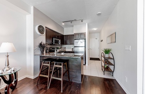 Bathurst Quay Apartment | Elegant Downtown Oasis with City and Lake Views Plus Parking!