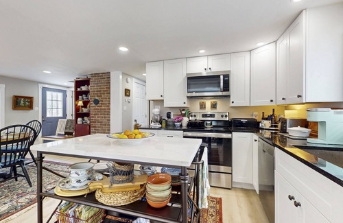 Wiscasset House | Elegant home with a cozy living area, Wifi, backyard, and washer/dryer