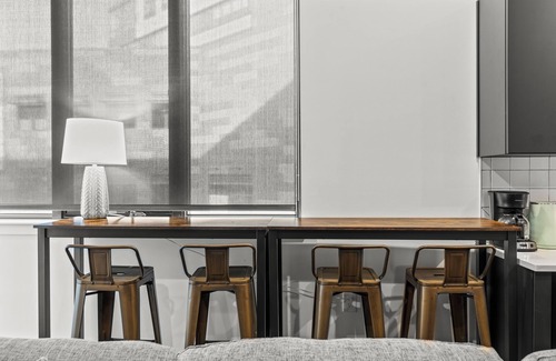 West Poplar Apartment | Elegant King Bed Condo Steps From the MET