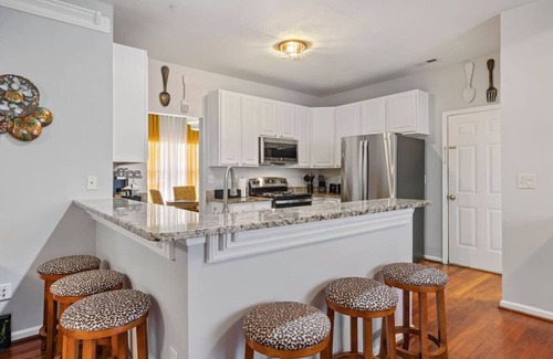 Varina House | Elegant Retreat: Spacious with Outdoor Fireplace