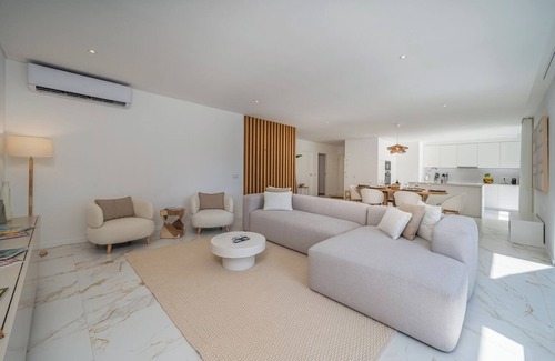 Penina Apartment | Elegant Retreat with Pool and Terrace by HostWise