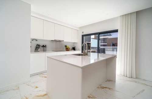 Penina Apartment | Elegant Retreat with Pool and Terrace by HostWise