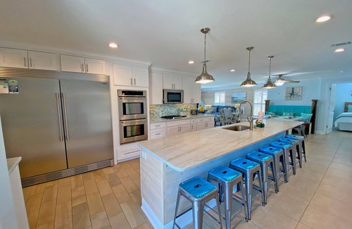 Pensacola Beach House | Elegantly decorated 3 bdr/3.5 bath home in gated community w/pool & pier.