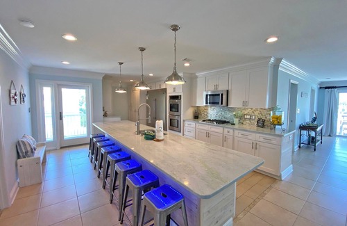 Pensacola Beach House | Elegantly decorated 3 bdr/3.5 bath home in gated community w/pool & pier.