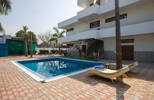Faridabad Villa | ELIVAAS Ivory estate 5 BHK Farm with Pvt Pool, Gazebos & Lounge Area
