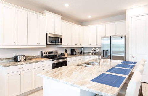 West Kissimmee Villa | Encore Resort Luxury Villa Private Pool, Theater, Game Room & Themed Bedrooms