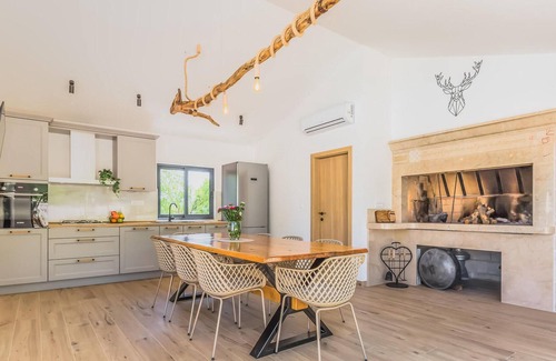 Lovrec House | Enjoy a relaxing time in this comfortable vacation home with pool.