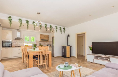 Lovrec House | Enjoy a relaxing time in this comfortable vacation home with pool.